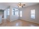 Open living area features tile flooring, neutral paint, and multiple windows for an airy, inviting atmosphere at 931 S Racine Ln, Gilbert, AZ 85296