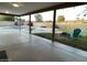 Relaxing covered patio with a view of the pool, fire pit, and backyard at 9615 N 34Th Ave, Phoenix, AZ 85051