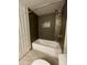 Features of a newly updated bathroom with a tiled shower and modern hardware at 9615 N 34Th Ave, Phoenix, AZ 85051