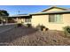 Charming home with a cozy front porch and well-maintained landscaping with brick exterior at 9615 N 34Th Ave, Phoenix, AZ 85051