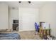 Bright bedroom featuring a ceiling fan, neutral walls, and a closet with plenty of space at 9759 E Brown Rd, Mesa, AZ 85207