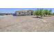 Well-maintained single-story home with desert landscaping, a three-car garage, and a welcoming facade at 9759 E Brown Rd, Mesa, AZ 85207