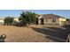 Charming single-story home with low maintenance desert landscaping and beautiful curb appeal at 9759 E Brown Rd, Mesa, AZ 85207