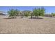 Charming single-story home featuring low maintenance landscaping and a welcoming facade at 9759 E Brown Rd, Mesa, AZ 85207