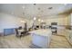 Spacious kitchen with a large island, pendant lighting, and ample cabinet space at 9759 E Brown Rd, Mesa, AZ 85207