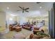 Bright, open-concept living space with hardwood floors and comfortable seating area at 9759 E Brown Rd, Mesa, AZ 85207