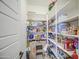 Well-stocked pantry with ample shelving space for storage at 9759 E Brown Rd, Mesa, AZ 85207