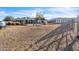 Expansive backyard with ample space, featuring a large barn, horse facilities and well maintained desert landscaping at 1044 E Irvine Rd, Phoenix, AZ 85086
