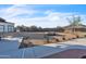 View of an expansive backyard with desert landscaping, rock features and a custom fence for privacy at 1044 E Irvine Rd, Phoenix, AZ 85086
