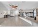 Spacious bonus room with tile floors, ceiling fans, and ample space for various activities at 1044 E Irvine Rd, Phoenix, AZ 85086