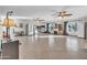 Bright bonus room with tile flooring, multiple windows, and plenty of open space for various activities at 1044 E Irvine Rd, Phoenix, AZ 85086