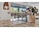 Stylish kitchen featuring granite countertops, a modern faucet, and a stainless steel sink at 1044 E Irvine Rd, Phoenix, AZ 85086