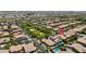 Aerial view of neighborhood featuring lush landscaping, parks and single Gathering homes at 10618 E Kinetic Dr, Mesa, AZ 85212