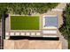 An aerial view of a backyard featuring synthetic grass, desert landscaping and a pergola at 10618 E Kinetic Dr, Mesa, AZ 85212