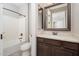 Bathroom with a vanity, large mirror, and shower/tub combo at 10618 E Kinetic Dr, Mesa, AZ 85212
