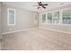 Bright bedroom boasting lots of natural light and a neutral color scheme at 10618 E Kinetic Dr, Mesa, AZ 85212