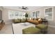Inviting living room showcasing lots of natural light, contemporary furnishings, and stylish decor at 10618 E Kinetic Dr, Mesa, AZ 85212