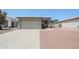 Charming single-story home with a two-car garage and desert landscaping in a friendly neighborhood at 11548 W Cottonwood Ln, Avondale, AZ 85392