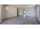 Spacious living room with wood-look floors, perfect for entertaining or relaxing at 11548 W Cottonwood Ln, Avondale, AZ 85392