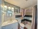 Unique bathroom with decorative tile accent wall, updated vanity, and tiled shower at 1226 W Purdue Ave, Phoenix, AZ 85021