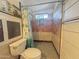 Cozy bathroom with stand-up shower with decorative tile and linen closet at 1226 W Purdue Ave, Phoenix, AZ 85021