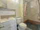 Bathroom featuring updated tile work, a shower and a vanity with a white cabinet at 1226 W Purdue Ave, Phoenix, AZ 85021