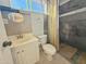 Bathroom featuring a vanity with mirror, toilet, and shower with curtain at 1226 W Purdue Ave, Phoenix, AZ 85021