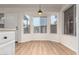 Bright breakfast nook with three windows and door at 1405 N Jamaica Way, Gilbert, AZ 85234