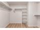 Walk-in closet with shelving and hanging storage at 1405 N Jamaica Way, Gilbert, AZ 85234