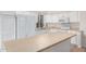 Bright kitchen with white cabinets and island at 1405 N Jamaica Way, Gilbert, AZ 85234