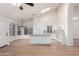 Open living area with kitchen, island, and breakfast nook at 1405 N Jamaica Way, Gilbert, AZ 85234