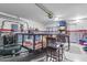 Organized garage space with storage solutions and ample room for vehicles or hobbies at 1432 E Penny Ln, San Tan Valley, AZ 85140