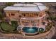 Stunning home with a private backyard featuring a pool, putting green, and outdoor entertaining spaces at 15054 E Sundown Dr, Fountain Hills, AZ 85268