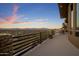 Outdoor dining on this homes balcony overlooking the desert and nearby mountains at 15054 E Sundown Dr, Fountain Hills, AZ 85268