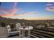 Enjoy the beautiful sunset views from this homes balcony with room for outdoor dining at 15054 E Sundown Dr, Fountain Hills, AZ 85268