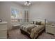 Bedroom featuring neutral decor, shutters, and carpet flooring at 15054 E Sundown Dr, Fountain Hills, AZ 85268