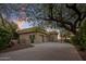 Desert home featuring a paver driveway and lush, desert-friendly landscaping at 15054 E Sundown Dr, Fountain Hills, AZ 85268