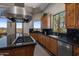Gourmet kitchen featuring granite counters, stainless steel appliances, and scenic views at 15054 E Sundown Dr, Fountain Hills, AZ 85268