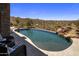 Inviting pool and spa area with comfortable lounge chairs and desert views, perfect for outdoor relaxation at 15054 E Sundown Dr, Fountain Hills, AZ 85268