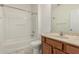 Bathroom offers a shower/tub combo, toilet and vanity at 15429 W Ventura St, Surprise, AZ 85379