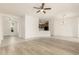 Bright open-concept living space with modern floors and plenty of natural light at 15429 W Ventura St, Surprise, AZ 85379