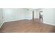 Hardwood floors and an arched opening to another room in this well lit space at 1609 W Lewis Ave, Phoenix, AZ 85007