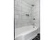 Bathroom features marble tile in shower and bronze fixtures at 1621 W Mulberry Dr, Phoenix, AZ 85015