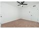 Empty bedroom with a ceiling fan and closet at 1621 W Mulberry Dr, Phoenix, AZ 85015