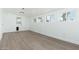 Bonus room with multiple windows and vinyl flooring at 1621 W Mulberry Dr, Phoenix, AZ 85015