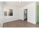 Bright dining room with hardwood floors and access to a modern, updated kitchen at 1621 W Mulberry Dr, Phoenix, AZ 85015