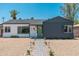Charming home featuring a lovely brick pathway and a modern, two-toned exterior design at 1621 W Mulberry Dr, Phoenix, AZ 85015