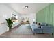 Staged living room showcasing hardwood floors, contemporary furniture, and a modern decor at 1621 W Mulberry Dr, Phoenix, AZ 85015