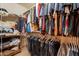 Walk-in closet with shelves and rods for optimal storage at 1814 N 89Th Ave, Phoenix, AZ 85037