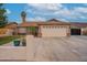 Charming single-story home boasting a spacious driveway and two-car garage in a well-maintained neighborhood at 1814 N 89Th Ave, Phoenix, AZ 85037